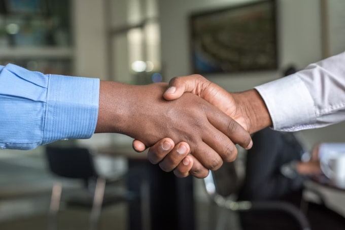 People having a handshake